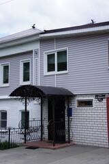 A house in the historical part of the provincial town of Gorodets, standing on the high bank of the Mother Volga