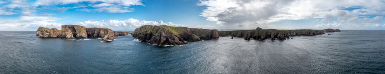 The cliffs and sea stacks at Port Challa on Tory Island, County Donegal, Ireland