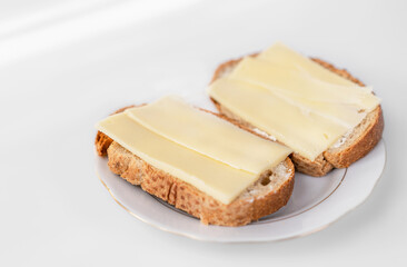 Cheese sandwiches on white background