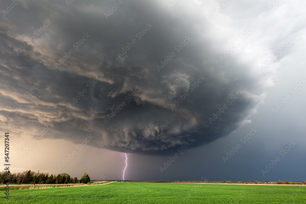 Canvas Prints storm clouds over a field