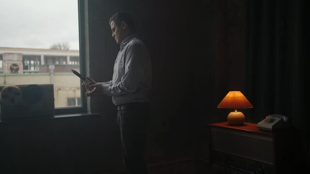 Special secret agent takes pistol gun. Spying or intelligence gathering. Espionage concept.