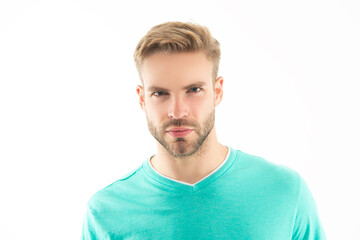 studio shot portrait of caucasian unshaven man. young unshaven man face isolated on white