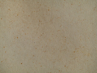 background with the texture of old paper. texture of paper with yellow inclusions
