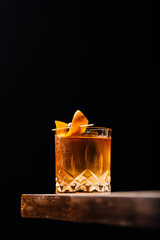 old fashioned cocktail classic bourbon whiskey and bitters, orange peel and cherry as garnish