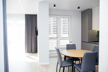 modern kitchen interior with chairs and table