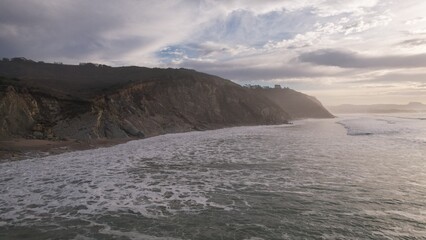 FRENCH DRONE France, aerial view, sea landscape with water, sky, nature. Coast beach like a travel island with clouds in Bidart