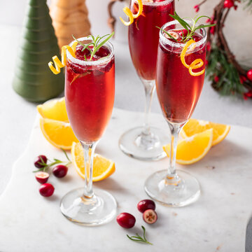 Christmas mimosa with cranberry juice and orange