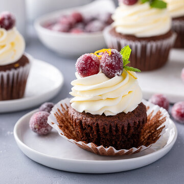 Sugared cranberry and orange chocolate cupcakes with cream cheese frosting