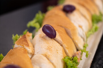 The olive in the sandwich - Together but alone