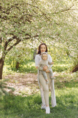 Fototapeta premium Family Enjoying Walk In Park