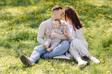 Fototapeta premium Family Enjoying Walk In Park