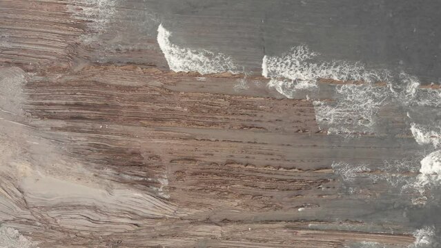drone flysch sea stack rock lines formation beach stones 