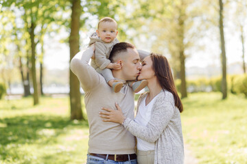 Fototapeta premium Family Enjoying Walk In Park