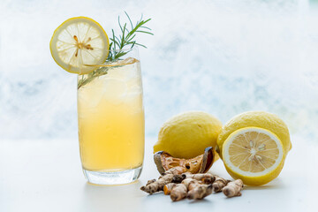 herbal drink. Herbal green tea with lemongrass and ginger in glass cup.