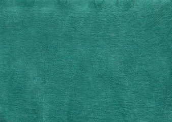 Texture of green leather. Closeup of surface