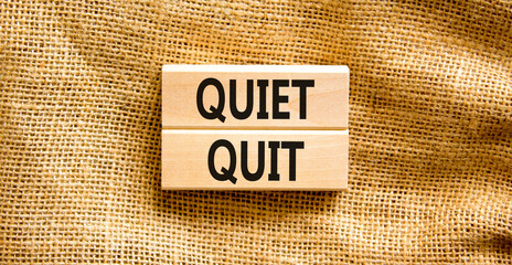 Quiet quit symbol. Concept words Quiet quit on wooden blocks. Beautiful canvas table canvas...