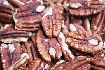 walnut on a plate on table , close up.