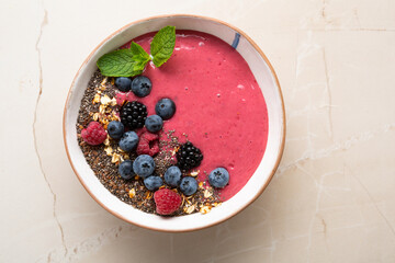 Fruit smoothie bowl with chia seeds top view vegan food
