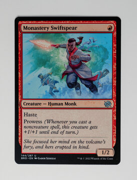 Hamburg, Germany - 10302022: photo of the English Magic The Gathering card Monastery Swiftspear from the 2022 the brothers war set.	