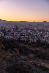 view of a large modern city among the mountains at dusk. Tbilisi. Georgia