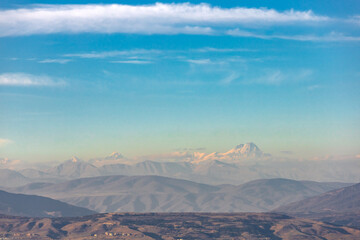 Fototapeta premium peak of Mount Kazbek among other mountains