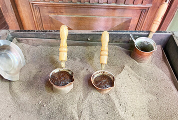 Traditional turkish coffee brewed in sand for getting the finest aroma