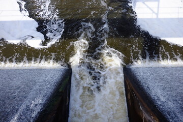 water running over a damn