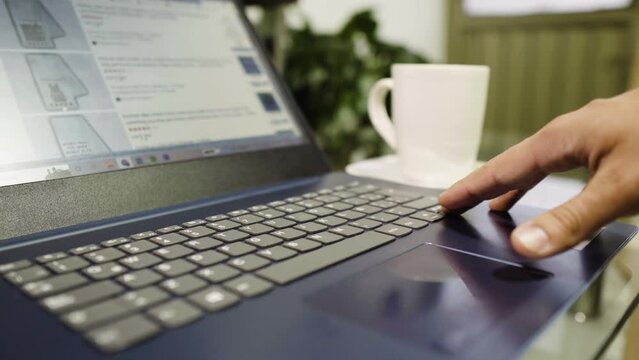 man with credit card, uses credit card to pay for goods and services online, the concept of using a credit card to shop online, order goods and services by checking on web page 