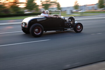 Fototapeta premium hot rod speeding by