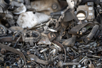 metallic spare parts or junk in a car repair garage