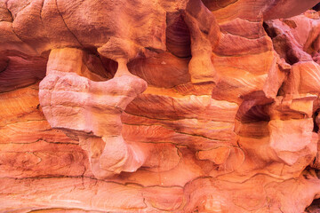Red stones and the texture of the walls in Colored canyon, Sinai desert, Sinai peninsula, Egypt