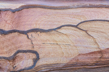Red stones and the texture of the walls in Colored canyon, Sinai desert, Sinai peninsula, Egypt