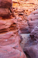 Amazing nature landscape of famous Coloured Canyon, bizarre rock formation located in the Sinai mountain range, Sinai peninsula, Egypt. Outdoor travel background, popular tourist attraction