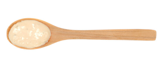 Sauce yogurt and garlic in wooden spoon isolated on white, top view
