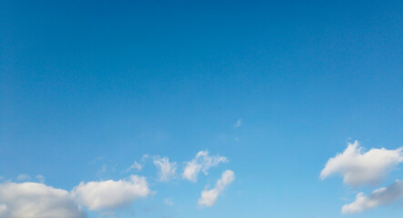 Blue sky with some clouds for background.