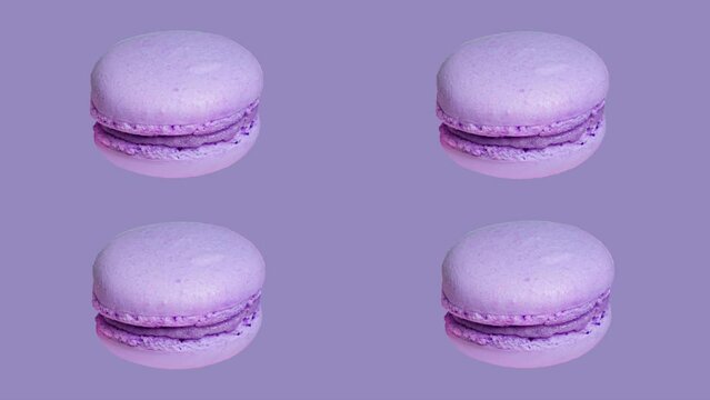 trendy food stop motion animation, sweet macaron cake of different colors on a purple background in pop art style