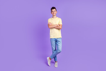 Fototapeta na wymiar Full size photo of young cheerful man happy positive smile agent crossed hands isolated over bright color background