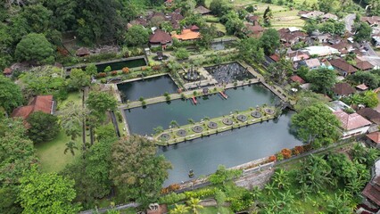 Fototapeta na wymiar Bali, Indonesia - November 15, 2022: The Water Garden of Tirta Gangga