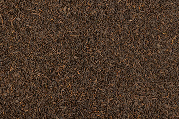 Dry black tea. Tea background.