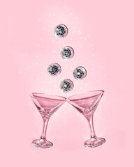 Glasses and shiny disco balls on pastel light pink background. Minimalistic party concept. Creative birthday composition. New Year cocktail idea.