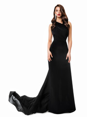 Fashion Woman in Black Long Dress. Beautiful Model in Evening Gown with Train over White Background. Elegant Lady with Holiday Wavy Hair style and Glamour Makeup - 547264393