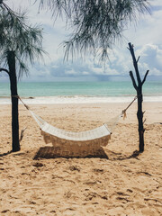Hammock at the beach on a beautiful summer day. 
