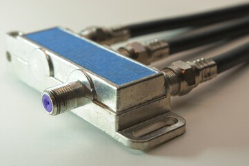 Coax cable splitter block with blue input F Connector