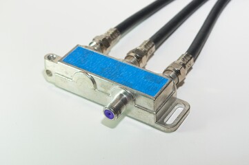 Coax cable splitter block with blue input F Connector