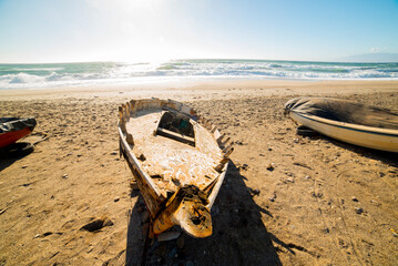 Old boat stranded on the beach