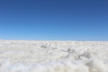View from the salt soil of Uyuni Salt Flat on dry season, Bolivia.