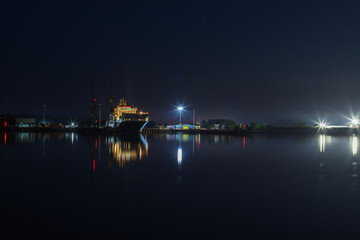 Fototapeta na wymiar An industrial ship at night