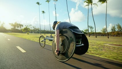 Disabled wheelchair paralympic athlete in wheelchair racing chair outside working out healthy lifestyle