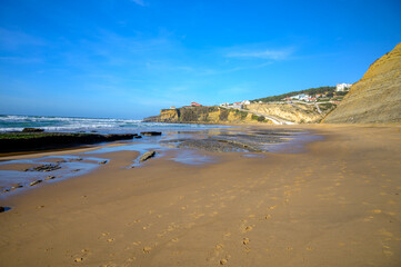 Magoito Beach, beautiful sandy beach on Sintra coast, Lisbon district, Portugal, part of Sintra-Cascais Natural Park with natural points of interest