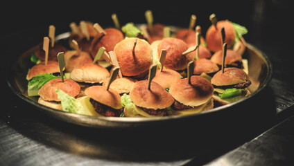 Mini burgers are served
